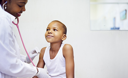 Shot of a pediatrician doing a checkup on a young boy