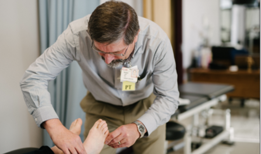 Therapist working on a patient's foot